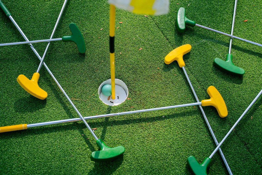golf clubs on the grass