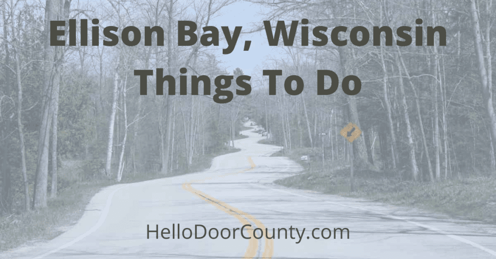 The curvy road in Door County, Wisconsin, with a semi-transparent blue overlay and text in black reading, "Ellison Bay, Wisconsin Things To Do HelloDoorCounty.com"
