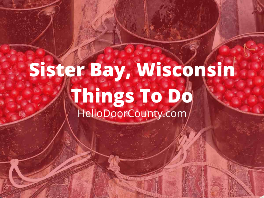 cherries in buckets in a pickup truck bed with a semi-transparent red overlay and the words "Sister Bay, Wisconsin Things To Do HelloDoorCounty.com"