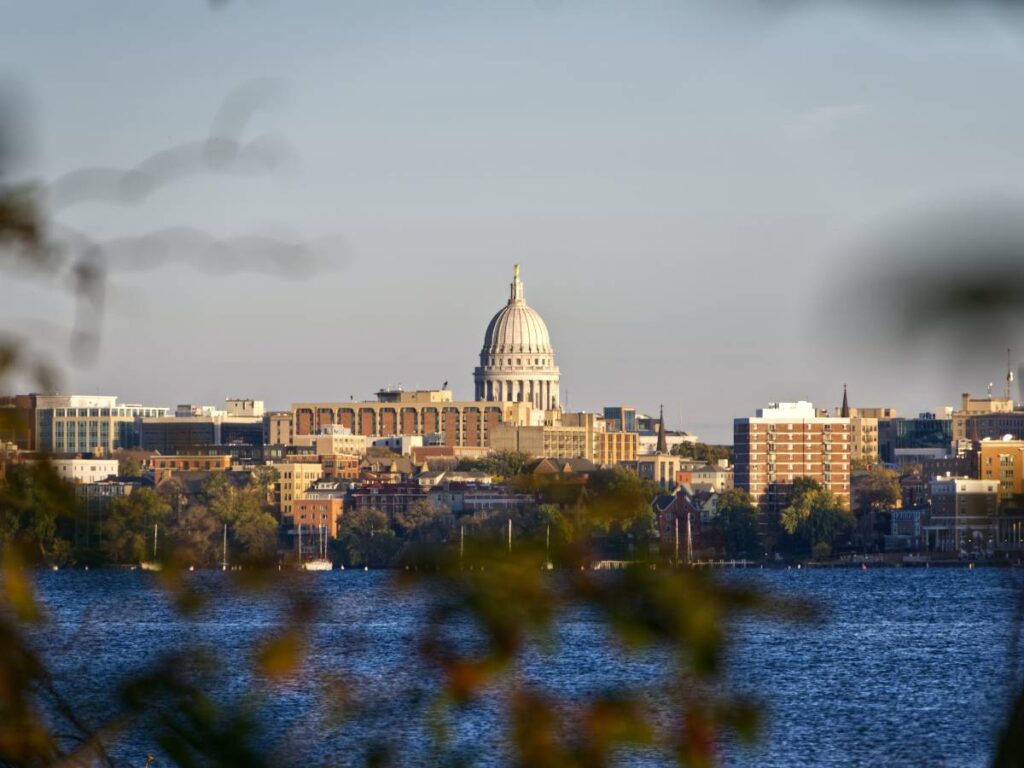 skyline of madison wisconsin shot from across a lake