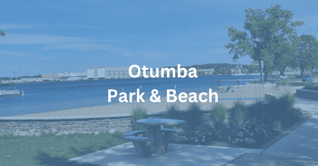 Scene of Otumba Park and Beach in Sturgeon Bay, WI with the superimposed text: Otumba Park & Beach.