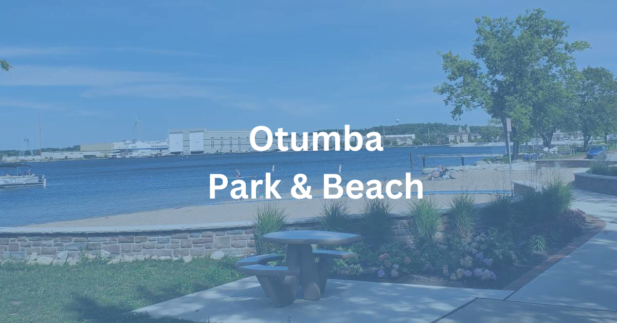 Scene of Otumba Park and Beach in Sturgeon Bay, WI with the superimposed text: Otumba Park & Beach.