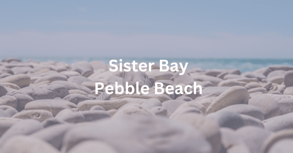 Pebbles on a beach. Superimposed text says: Sister Bay Pebble Beach