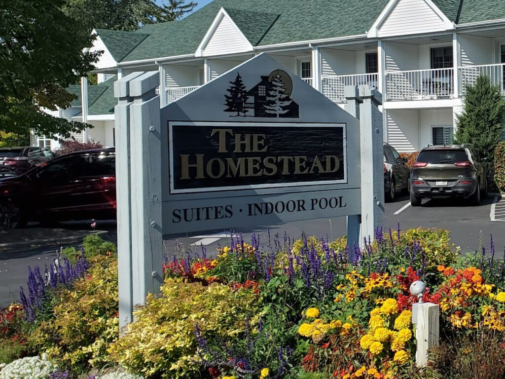 The Homestead Suites sign.