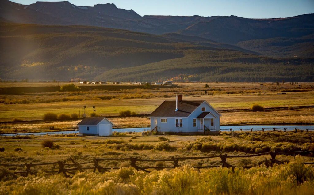 isolated house on the plains in front of hills
