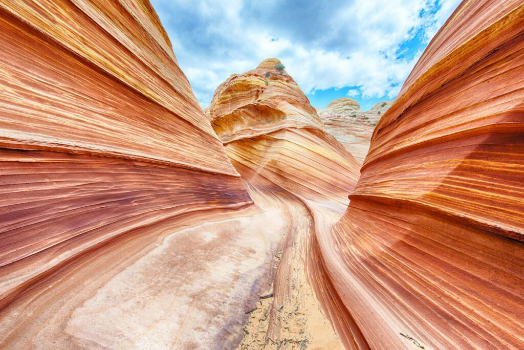 The Wave is an awesome vivid swirling petrified dune sandstone formation in Coyote Buttes North. It could be seen in Paria Canyon-Vermilion Cliffs Wilderness, Arizona. USA
