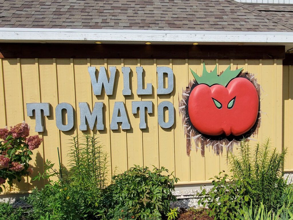 wild tomato storefront sign