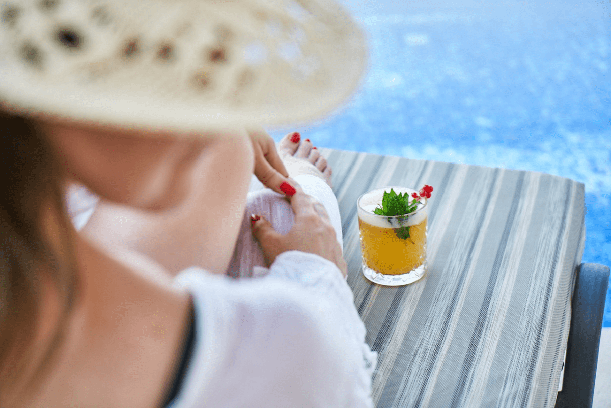 woman beside a pool
