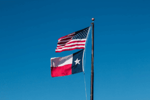 american and texas flags