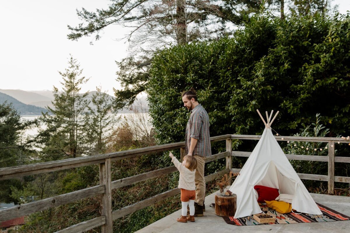 a father and child outdoors, camping